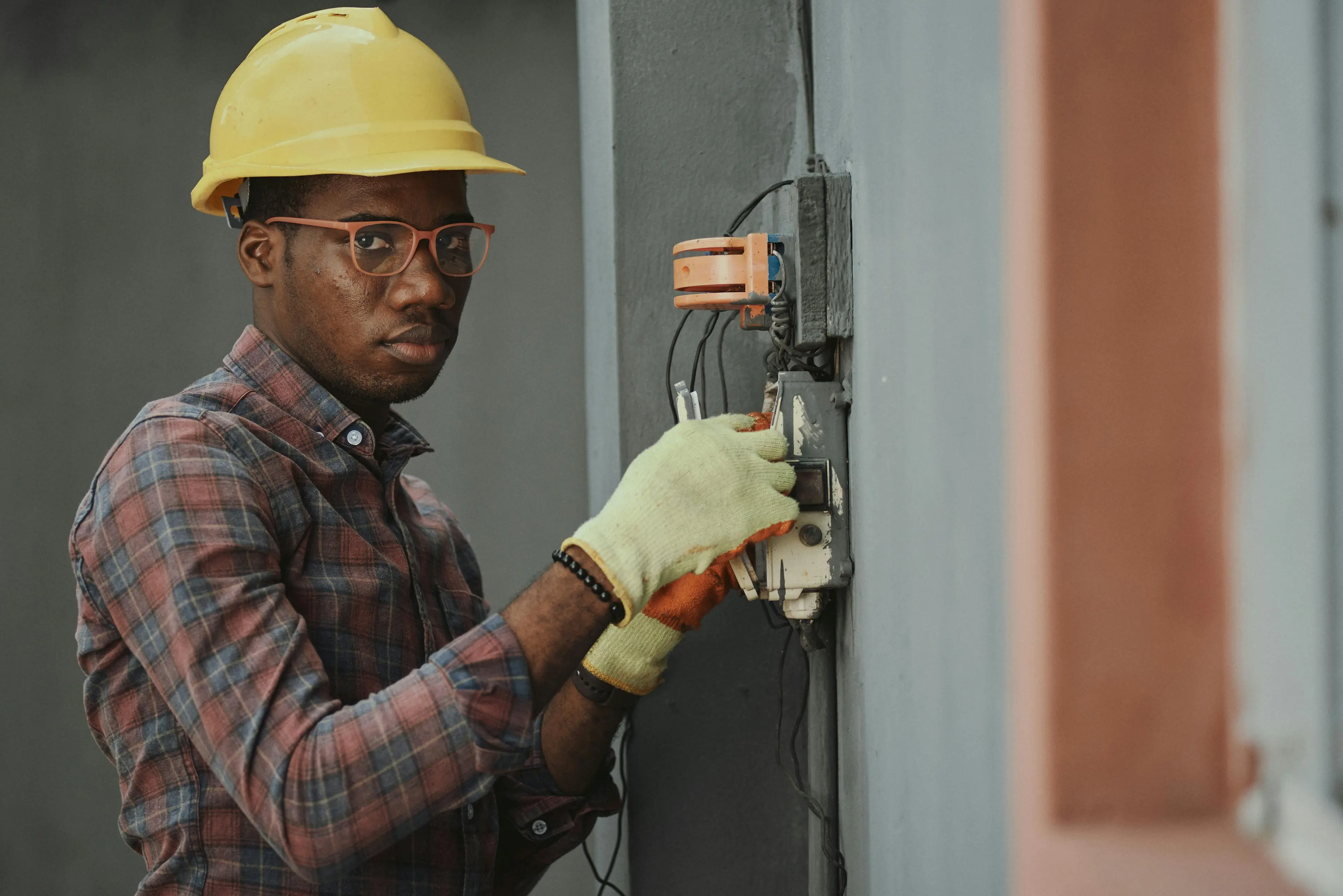 Close-up of an Electrician carrying out work